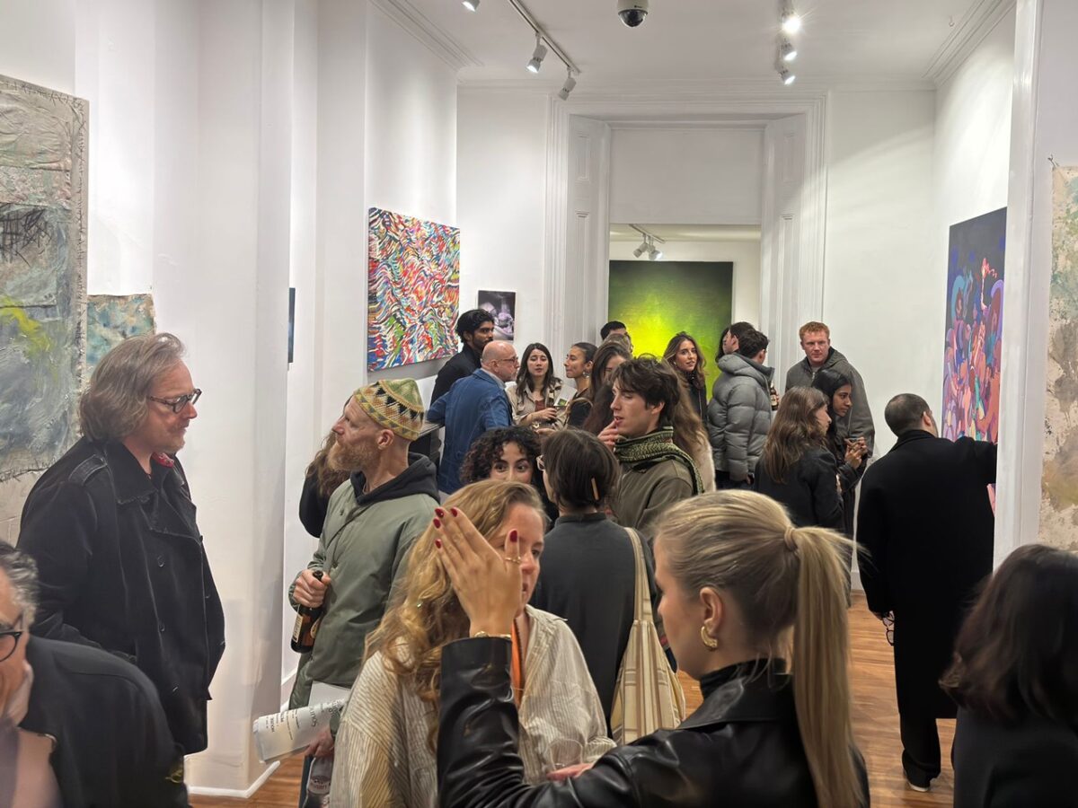 Private view of Terraforming at Museum Street, Bloomsbury, October 2025. Visitors fill the main corridor of the gallery during the Frieze Week opening, with exhibited works visible throughout the space.
